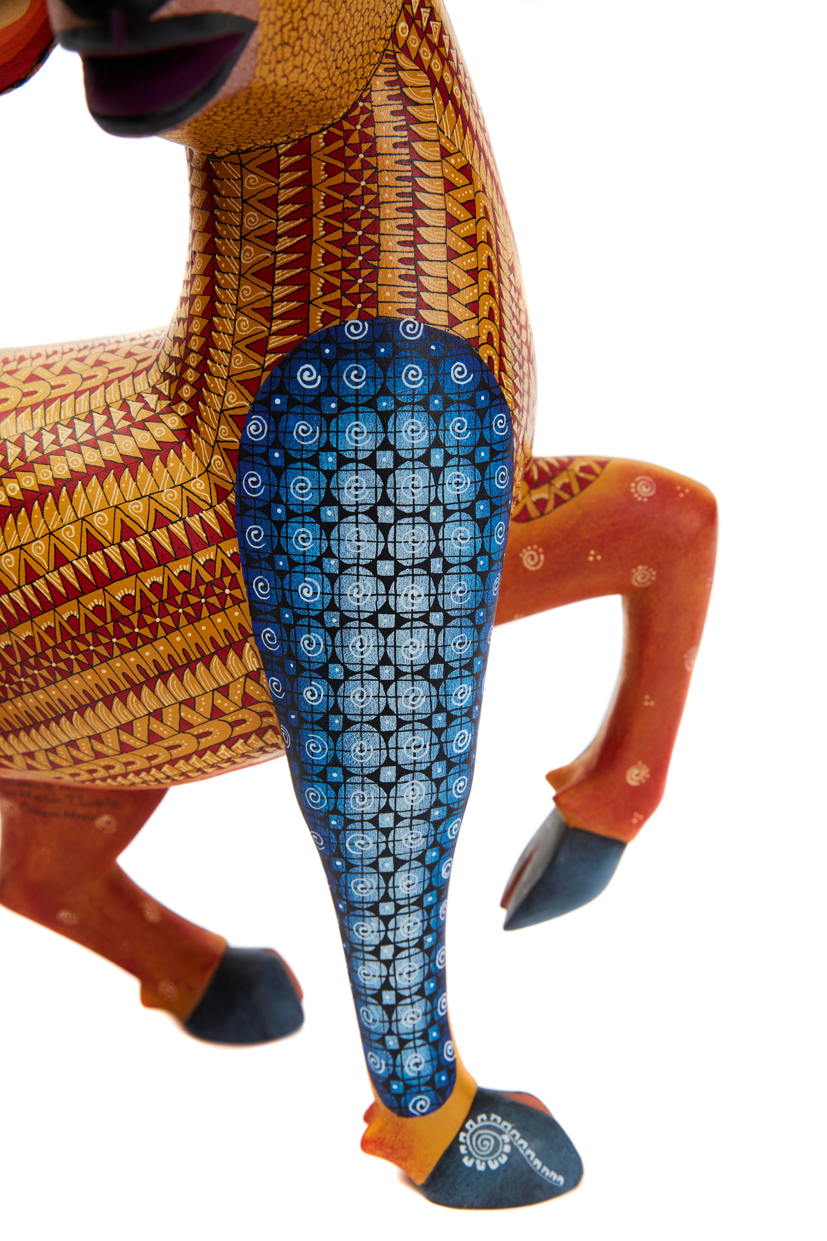 Venado Majestuoso -  Deer Alebrije
This Mexican Deer Alebrije made with Copal wood, wood carving technique gouges, machete and sandpaper, decorated with acrylic paintings with Zapotec symbols.
At Cactus Fine Art, we offer an exclusive selection of