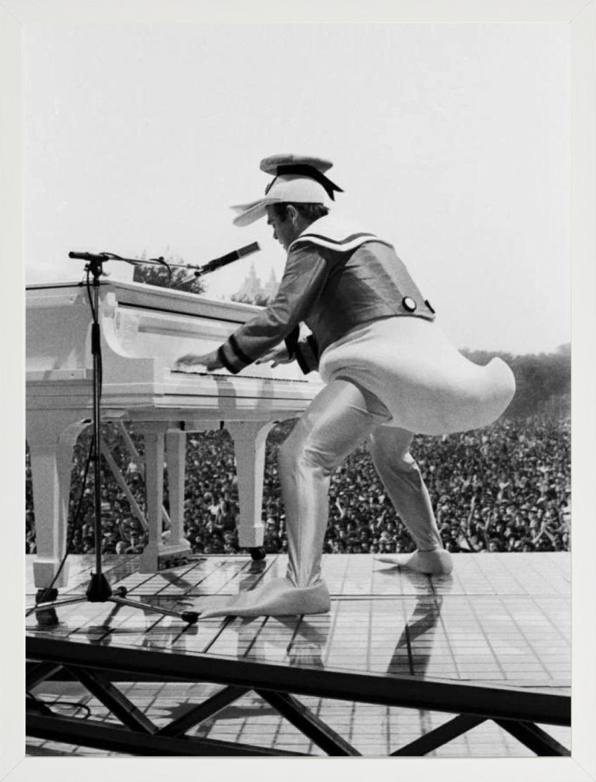Elton John, the superstar on stage in a duck costume, Fine Art Photography, 1980 For Sale 1