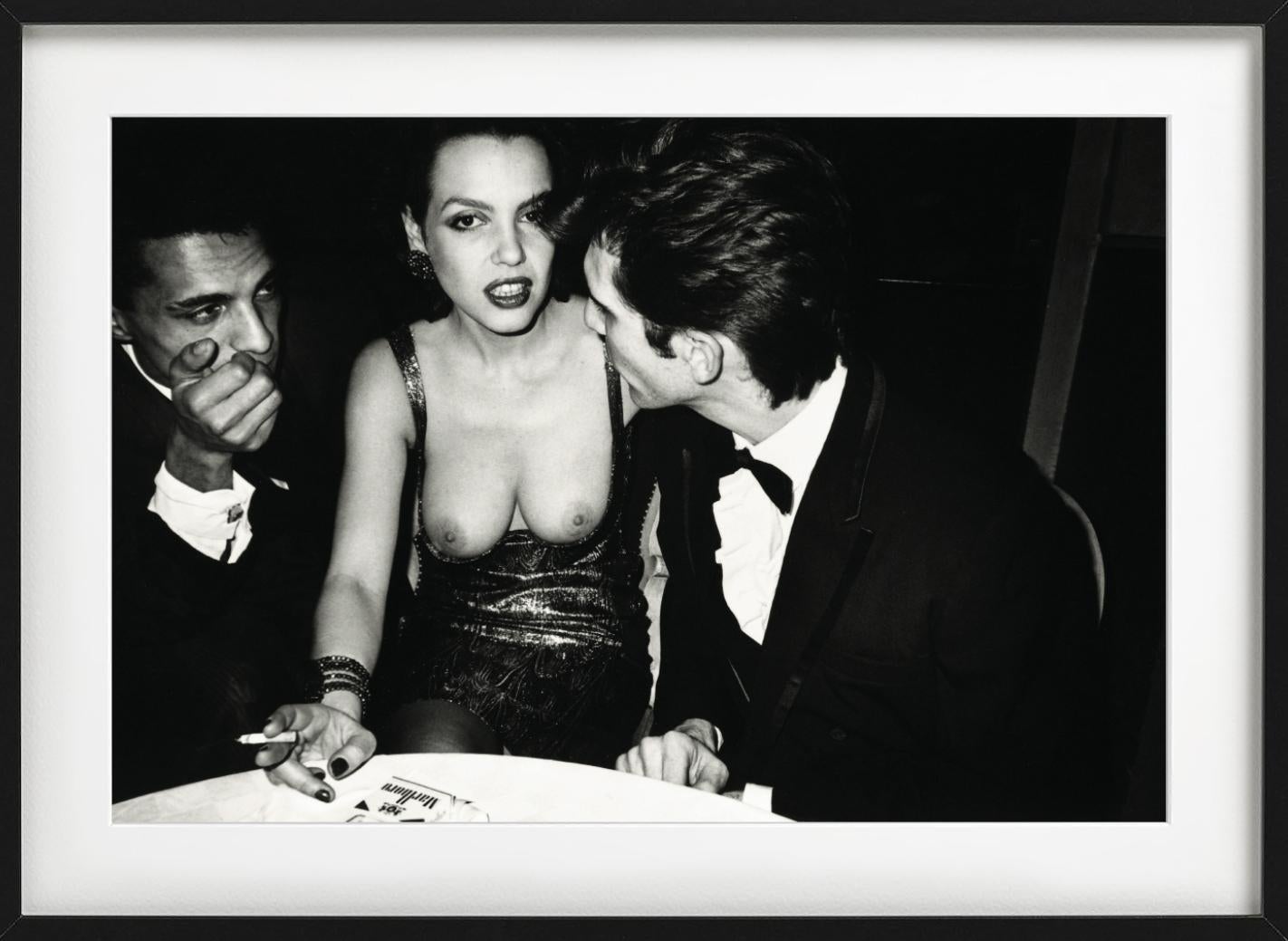 Martine Boutron flanked by her husband and friend, Le Privilege, Paris - Contemporary Photograph by Roxanne Lowit