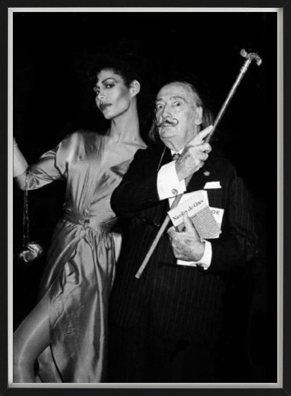 Potassa de la Fayette and Salvador Dali, black and white portrait photography, done in New York City by the iconic backstage party photographer Roxanne Lowit.

All prints are limited edition. Available in multiple sizes. High-end framing on