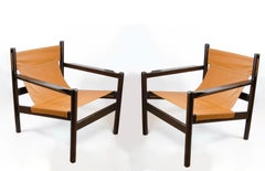 Roxinho vintage Safari armchair in leather and wood by MCM Michel Arnoult, 1960s