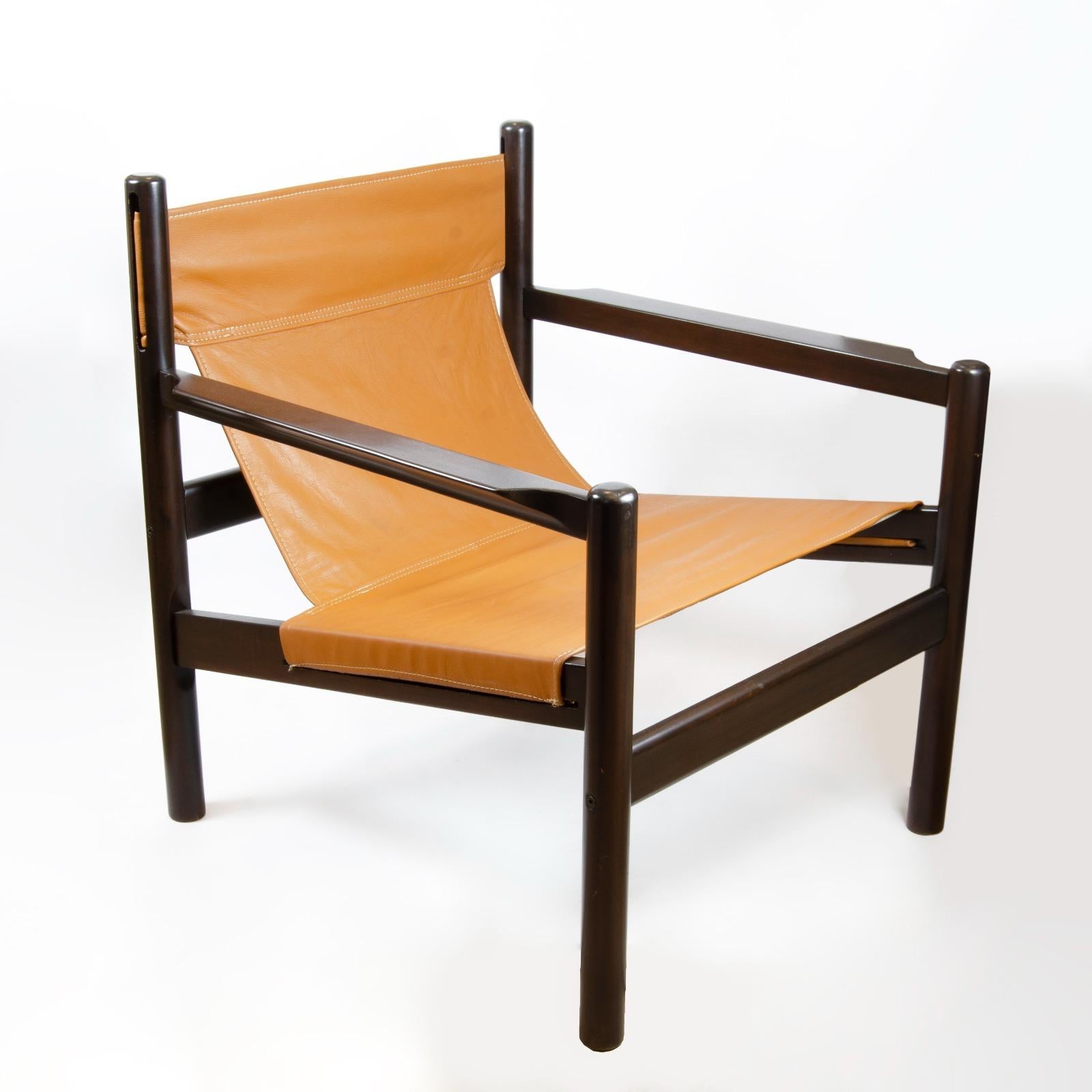 Woodwork Roxinho vintage Safari armchair in leather and wood by MCM Michel Arnoult, 1960s For Sale
