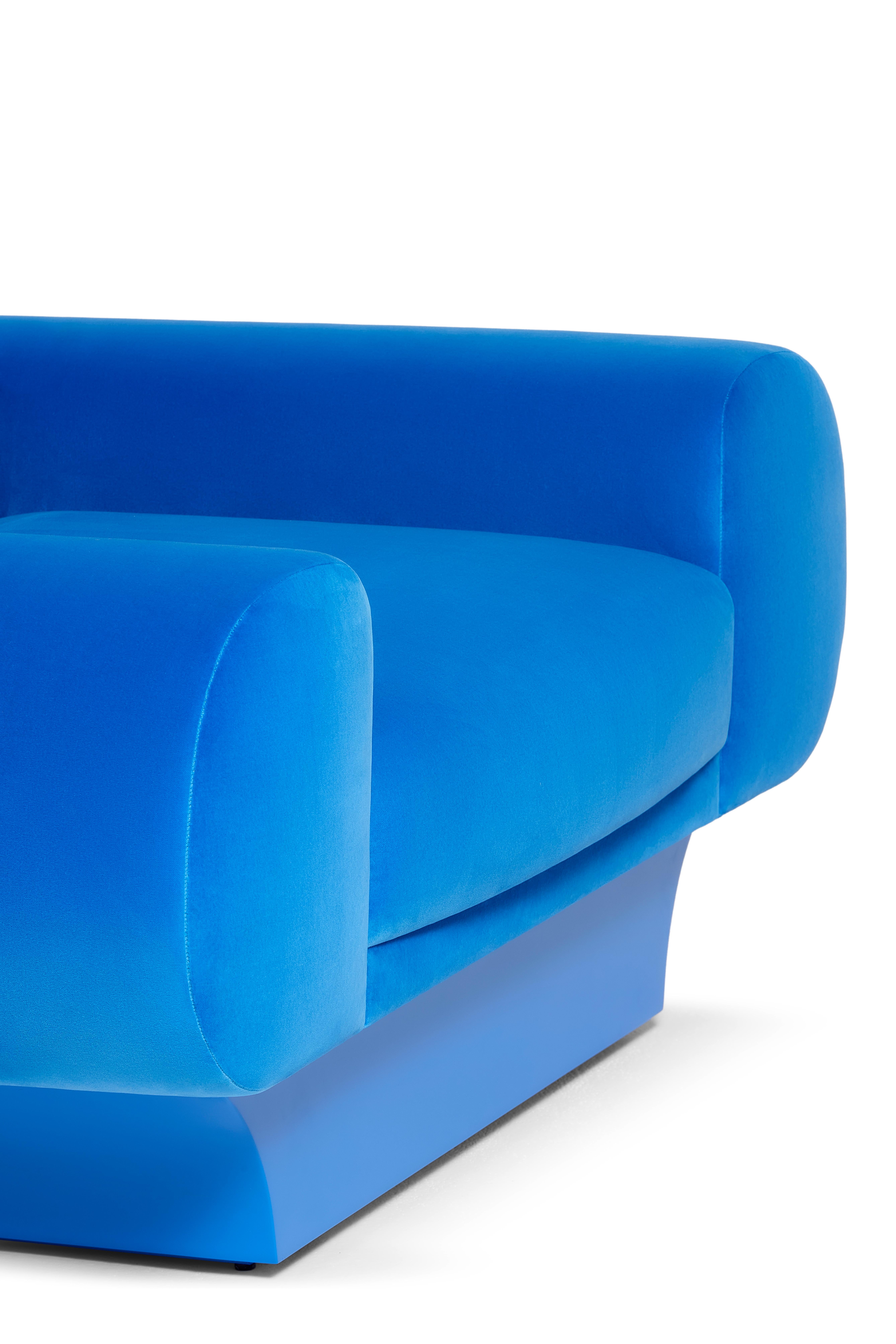 Roy Armchair by Munna
Dimensions: D 115 x W 140 x H 83  cm. SH: 42 cm.
Materials: Wood, foam, and upholstery.
Finish: Cotton Velvet, ref. Cerulean, CV35, and Cerulean matt lacquer.

Available in all Munna fabrics except Wild Silk. Available in