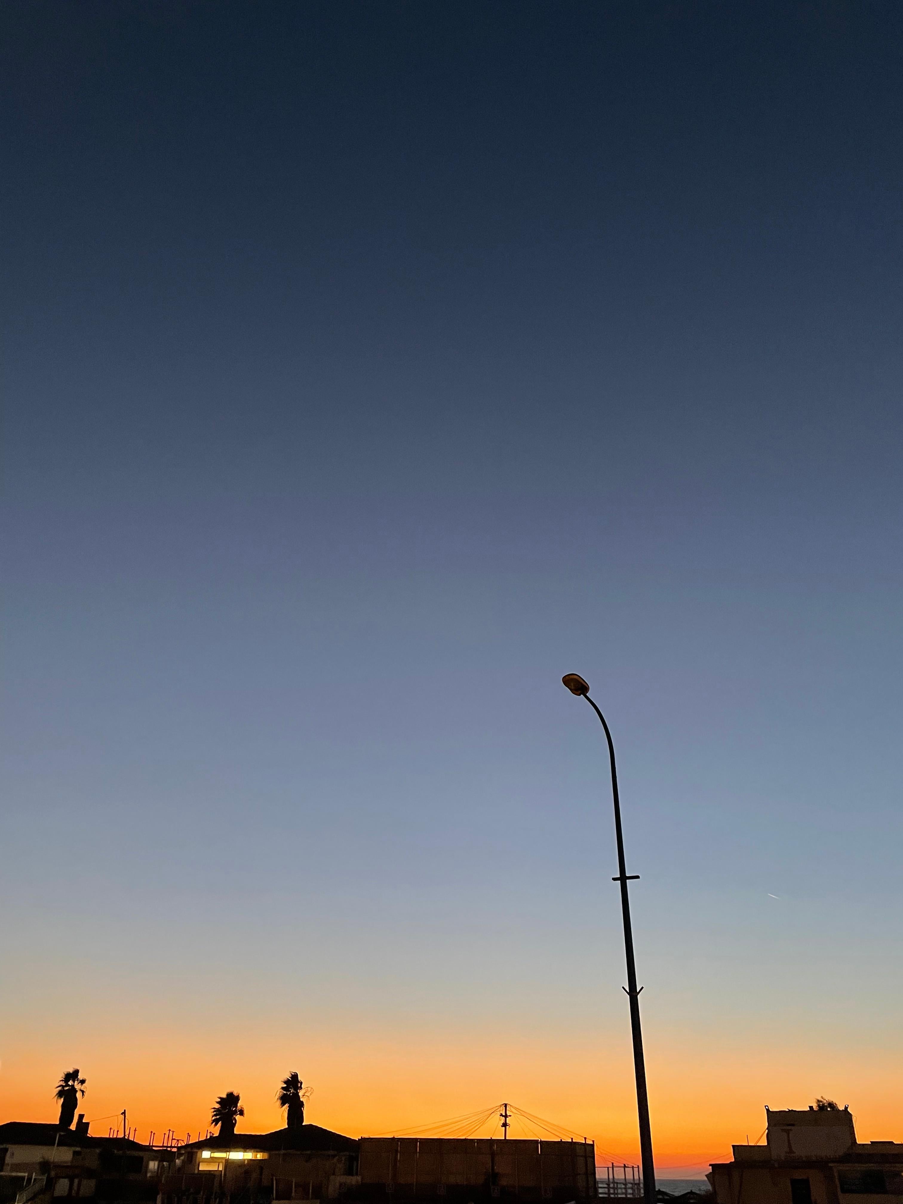 Street light - color photography, landscape photography - Photograph by Roy Dagan