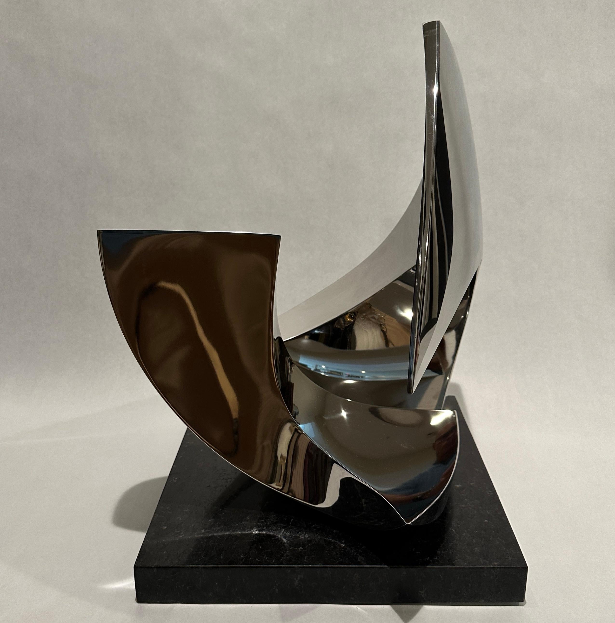 Polished stainless steel abstract sculpture, 