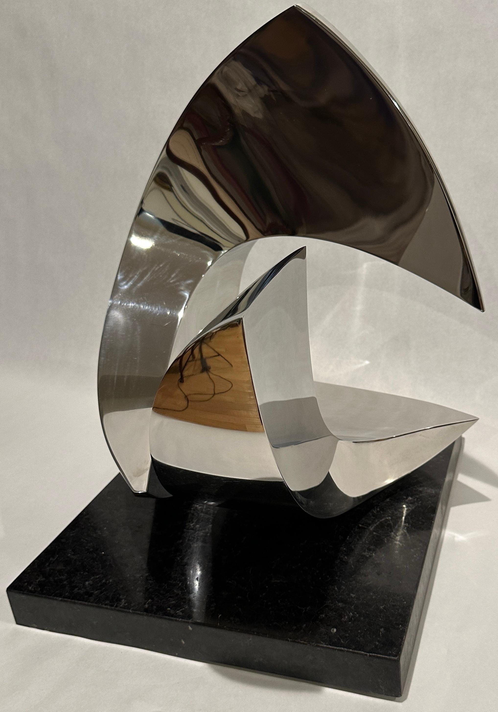 Polished stainless steel abstract sculpture, 