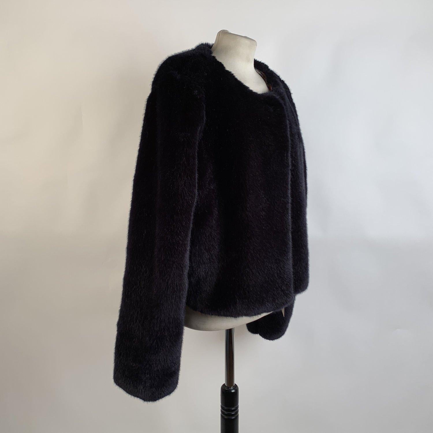 MATERIAL: Faux Fur COLOR: Blue MODEL: Faux Fur Jacket GENDER: Women SIZE: Condition A - EXCELLENT Gently used Measurements SHOULDER TO SHOULDER: 17 inches - 43,2 cm BUST: 19.5 inches - 49,5 cm (flat - from side to side) SLEEVE LENGTH: 25 inches -