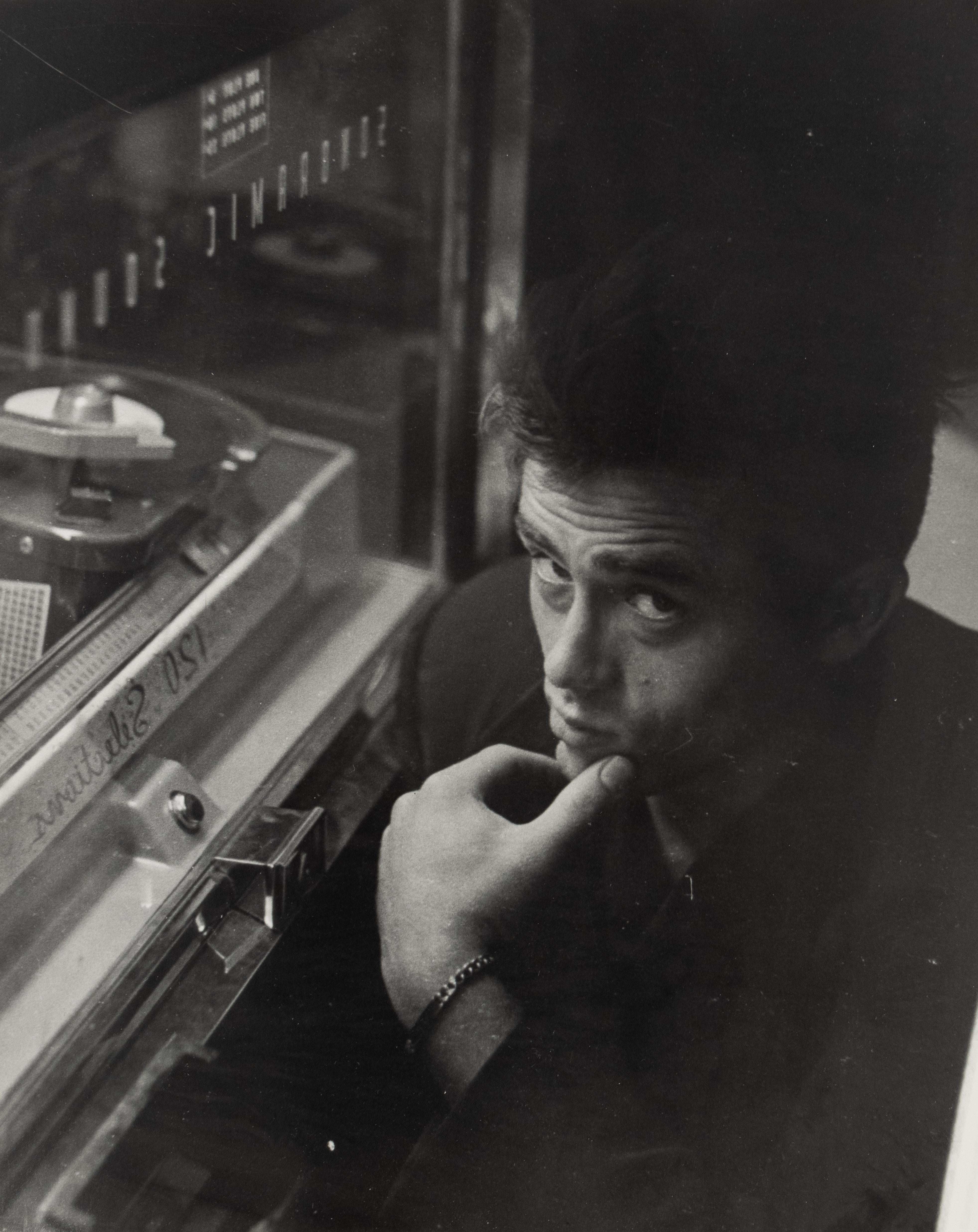 James Dean and Juke Box - black and white photograph by Roy Schatt

Artwork details:

Roy Schatt (1909-2002)
James Dean and Juke Box
c. 1954/printed later

Signed in pencil, verso; Also studio stamp, verso

Gelatin silver print

14 x 11 inches,