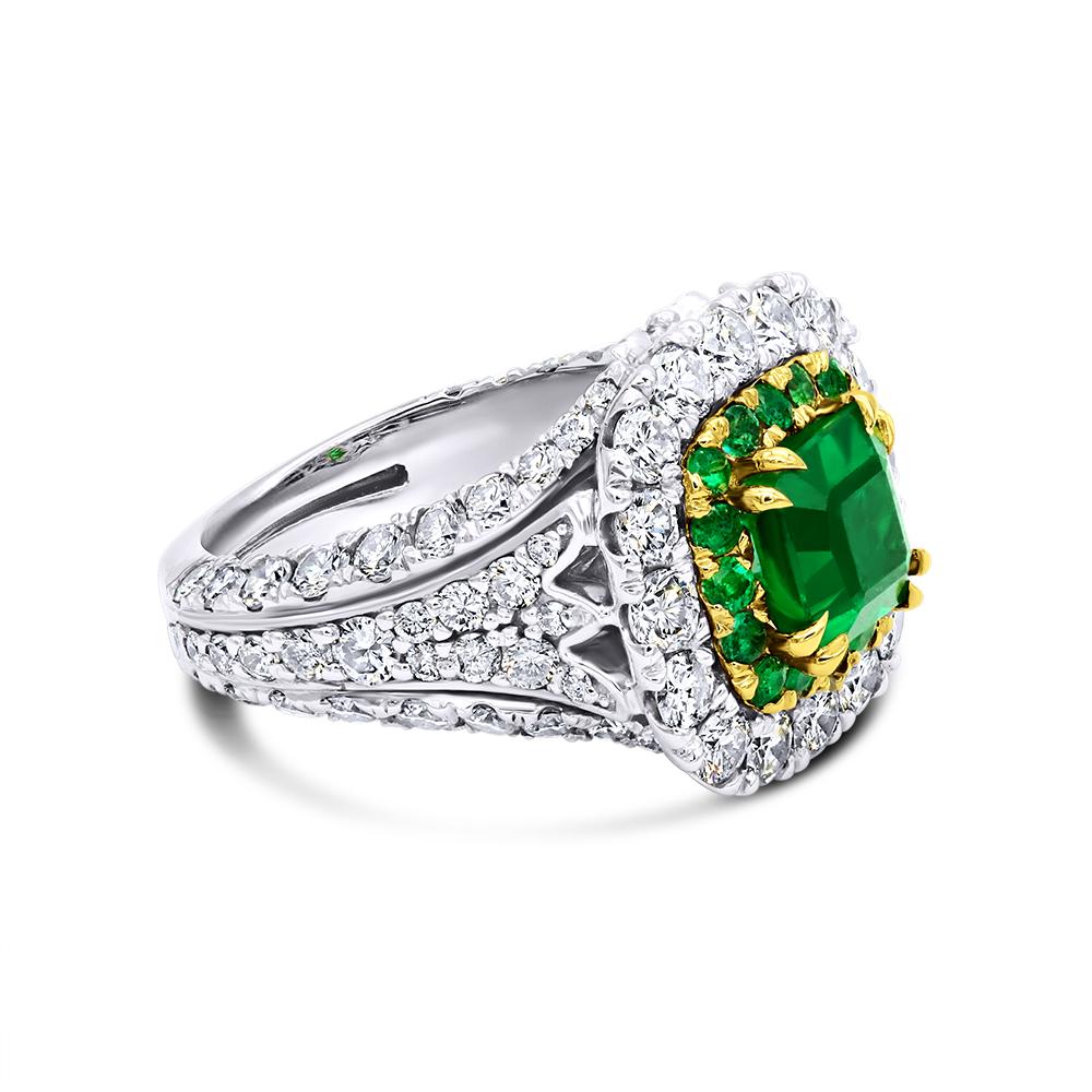 Royal 1.80ct Emerald Ring
 

–  Handcrafted in 14kt white gold,
– Containing 1.80ct Emerald cut natural emerald,
– Surrounded  by 3.67ctw round brilliant cut prong set halo setting
 

–  Handcrafted in 14kt white gold,
– Containing 1.80ct Emerald
