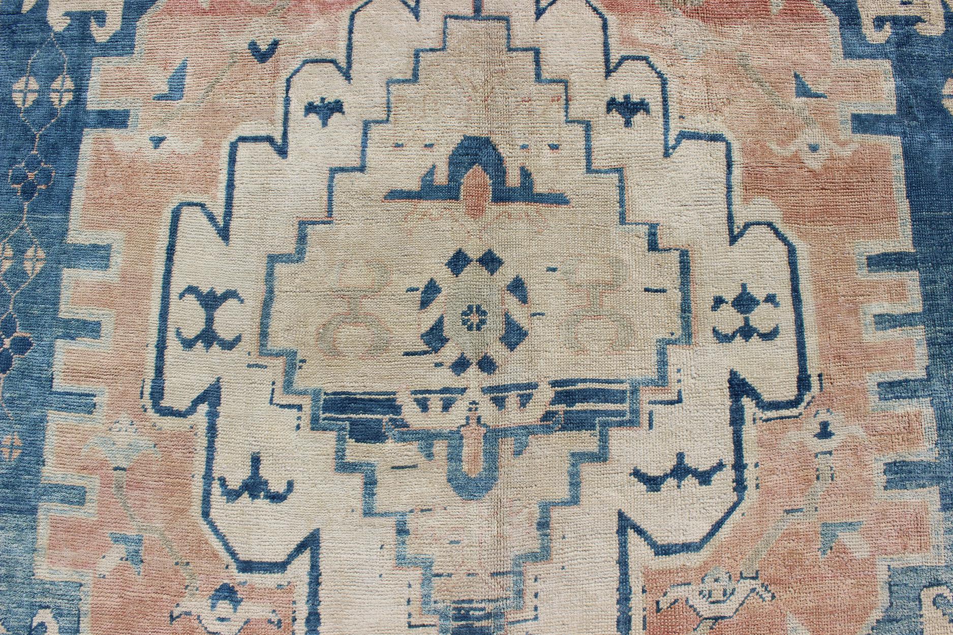Wool Blue and Salmon Vintage Turkish Oushak Rug with Layered Medallion and Motifs  For Sale