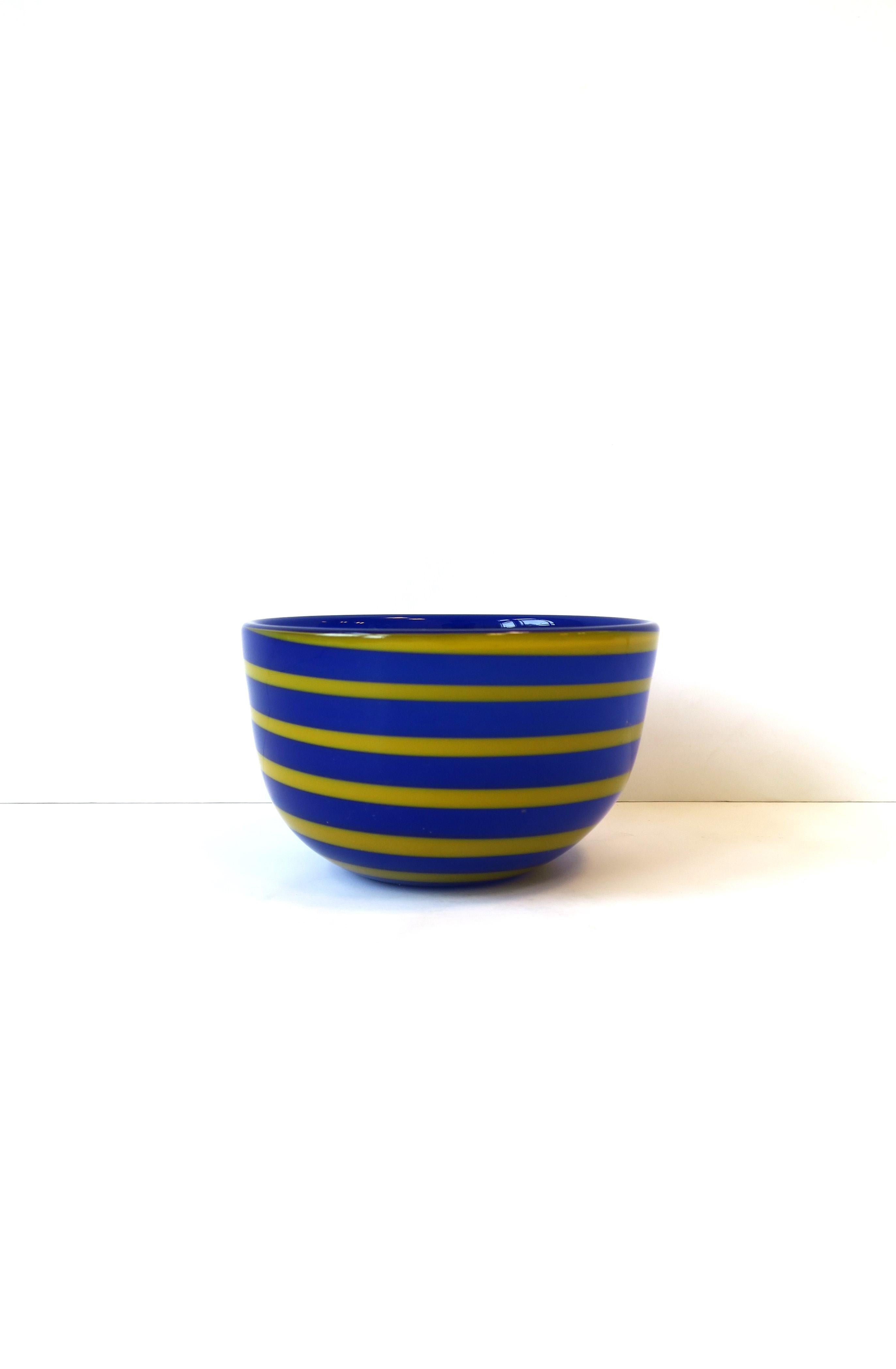 A royal or cobalt blue and yellow art glass bowl, 1995. Great as a stand-alone piece or hold candy or other on a desk, credenza, cocktail table, bookshelf, etc. Marked and dated on underside as shown in last image. Dimensions: 5.32