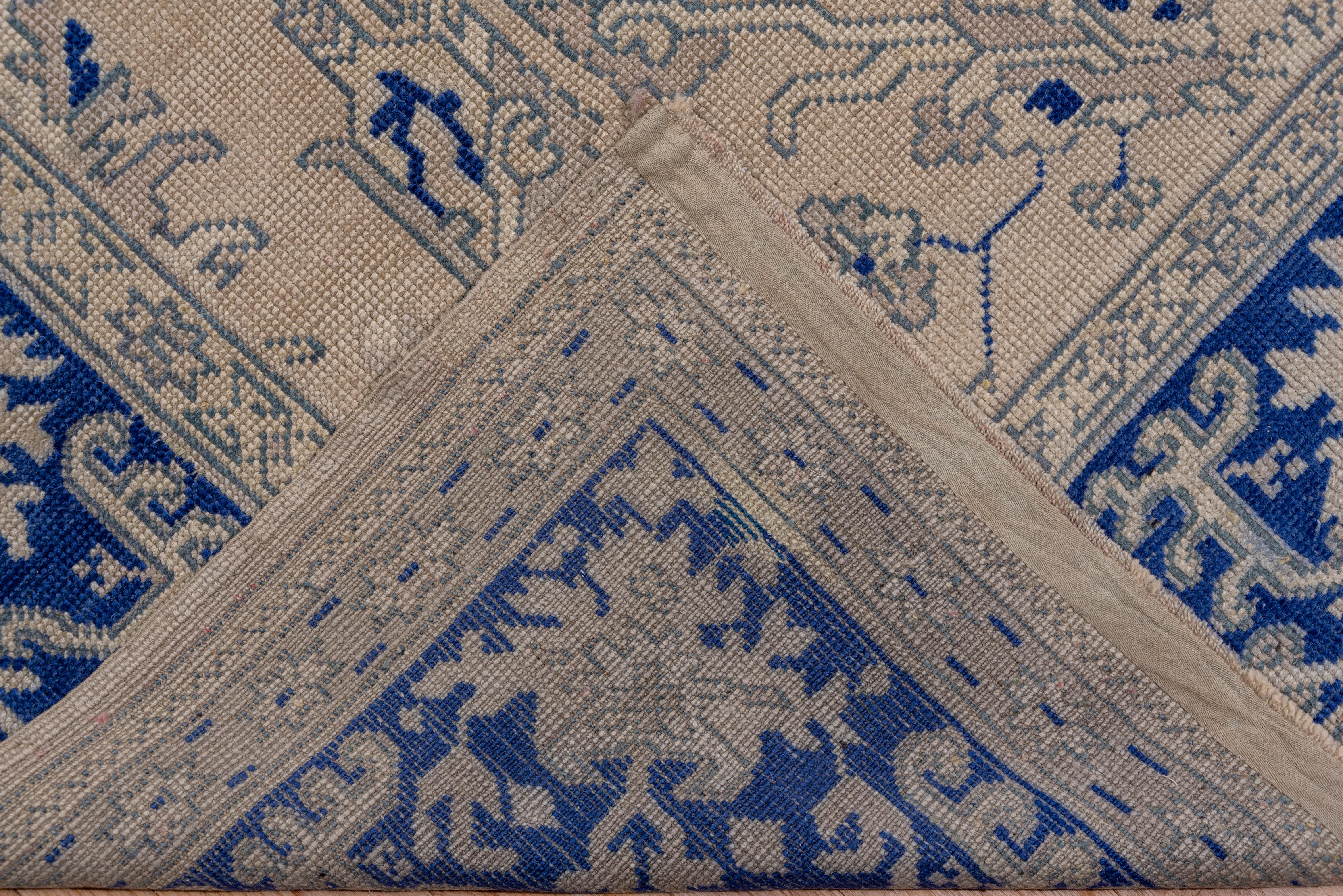 Hand-Knotted Royal Blue Bordered Antique Oushak Carpet For Sale