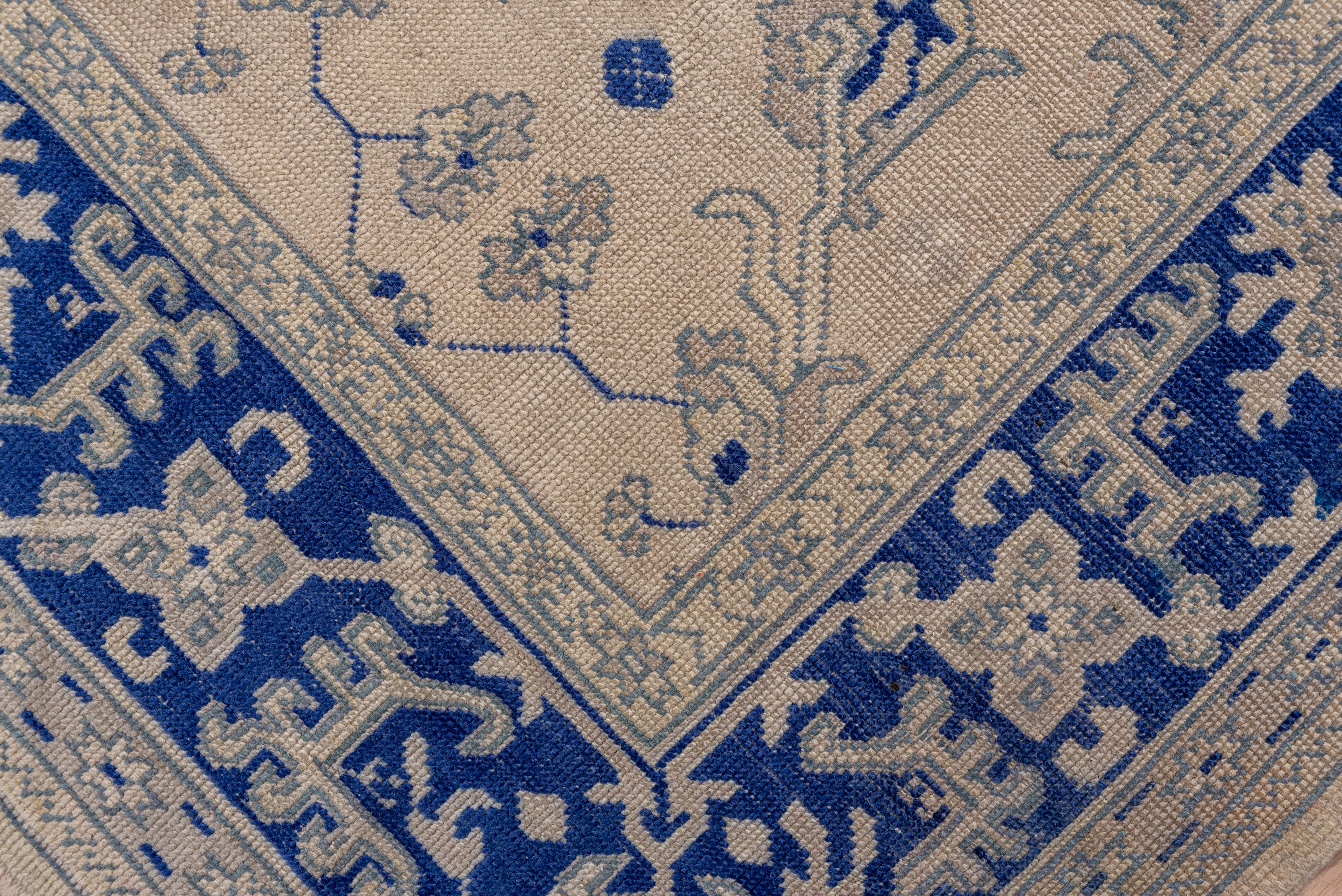 Royal Blue Bordered Antique Oushak Carpet For Sale 2