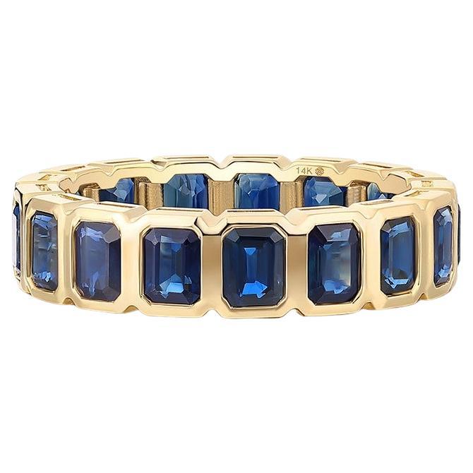 Anello Eternity con zaffiro blu reale taglio smeraldo in oro giallo 14k (18k)