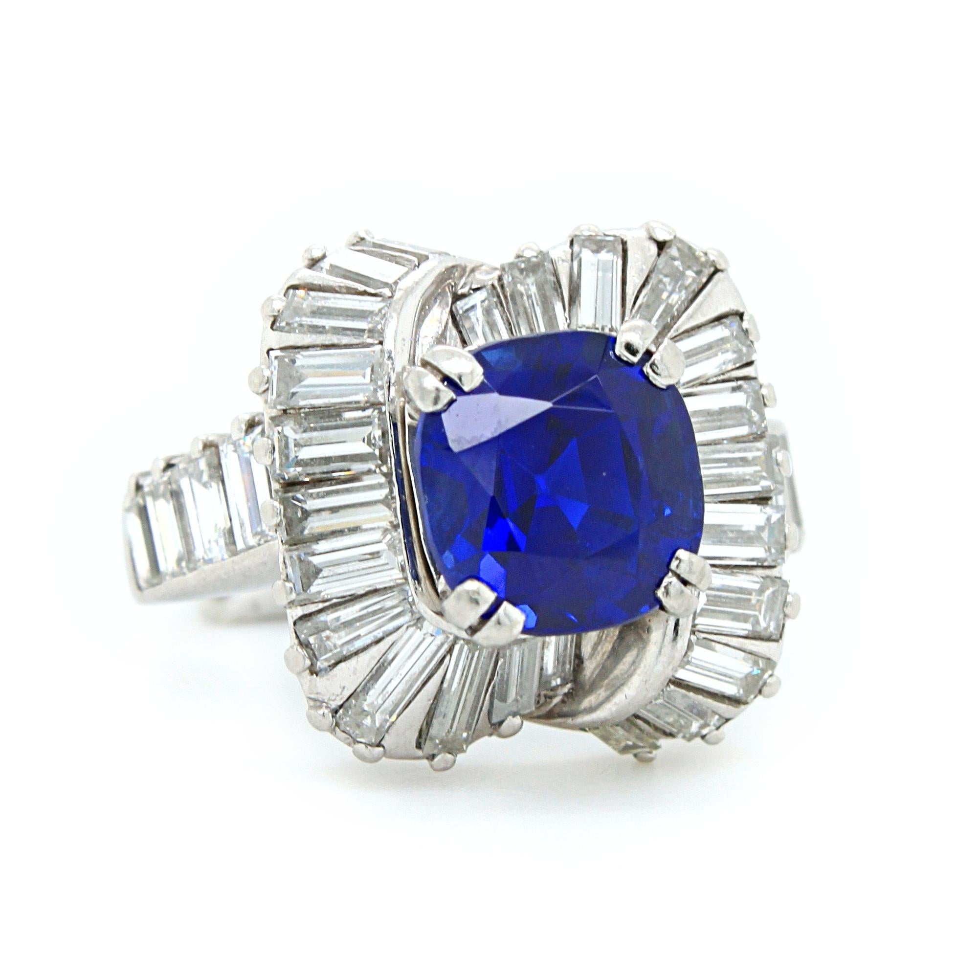 An exceptional Kashmir Sapphire and Diamond ring, by Mauboussin, ca. 1958. 

The centre sapphire is of Kashmir origin and unheated, weighing 3.19 carats. It is loup clean and a has a very strong and deep blue colour - also known as 'royal blue' by