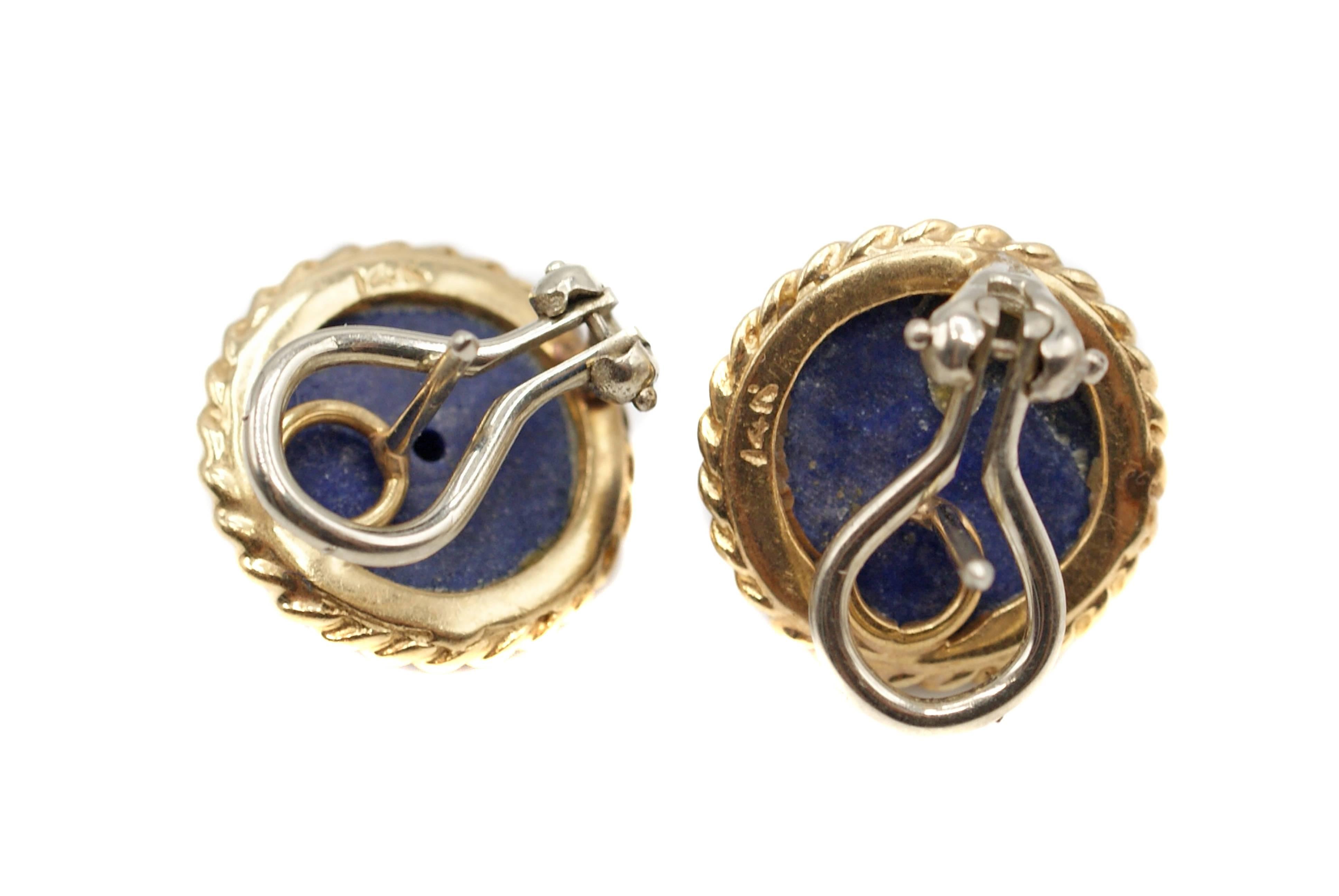 These beautiful royal blue lapis lazuli ear clips are perfectly matched in shape in color. Lapis of this fine quality has usually been mined in Afghanistan and has been cherished for its amazing blue for centuries. Measuring 13 millimeters or