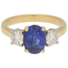 royal blue stone ring Royal Blue Sapphire and Diamond Three-Stone Engagement Ring Set in 18 Karat Gold