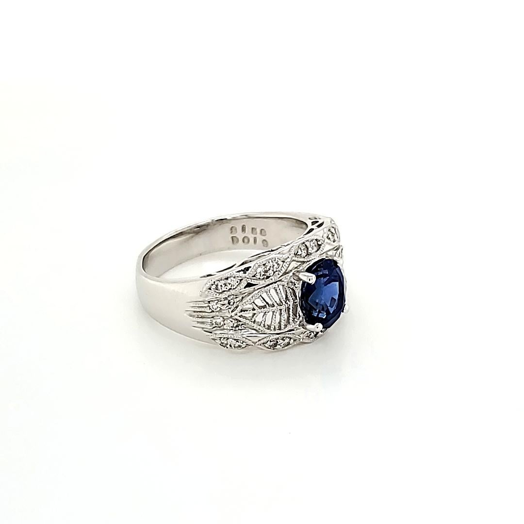 Royal Blue Sapphire and Diamond White Gold Engagement Ring:

A luscious Royal Blue Sapphire weighing 1.58 carat accented by 28 White Diamonds weighing 0.19 carat. A unique combination of Art-Deco inspired style combined with Modern-era's superb
