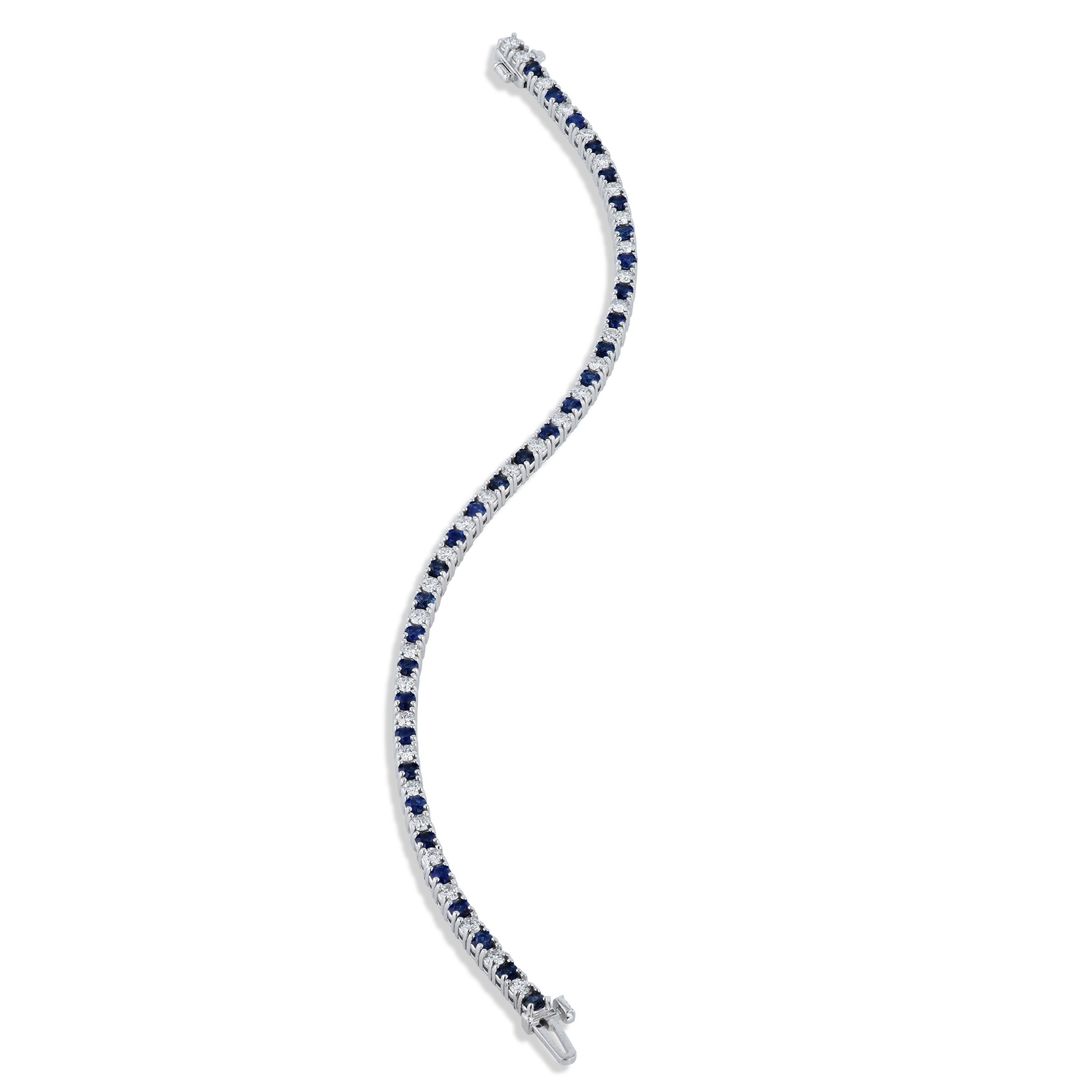 This glamorous 18kt white gold tennis bracelet features a dazzling spectacle of 32 royal blue sapphires and 33 diamonds, totaling an impressive 4.23 carat. Unmatched in brilliance and craftsmanship, it's the perfect gift to express love and