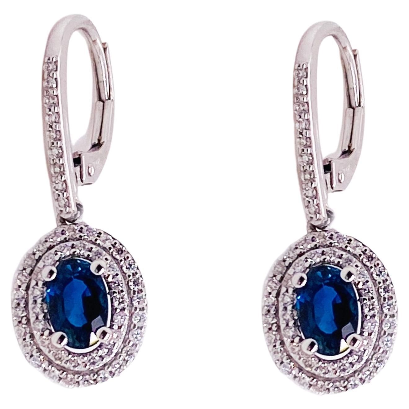 Royal Blue Sapphire and Double Diamond Halo Earrings, 1.34 Total Cts in 14KWG LV For Sale