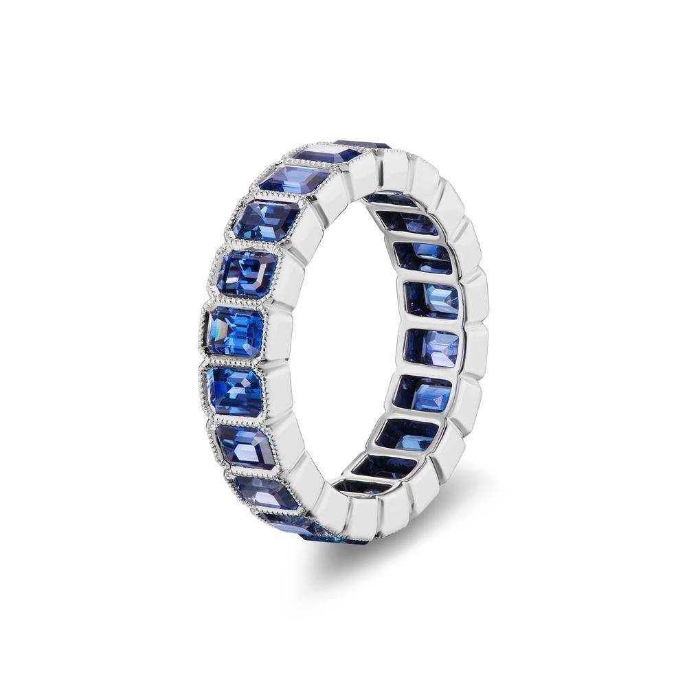 Modern 18k White Gold 5.84ct Royal Blue Sapphire Eternity Band For Sale