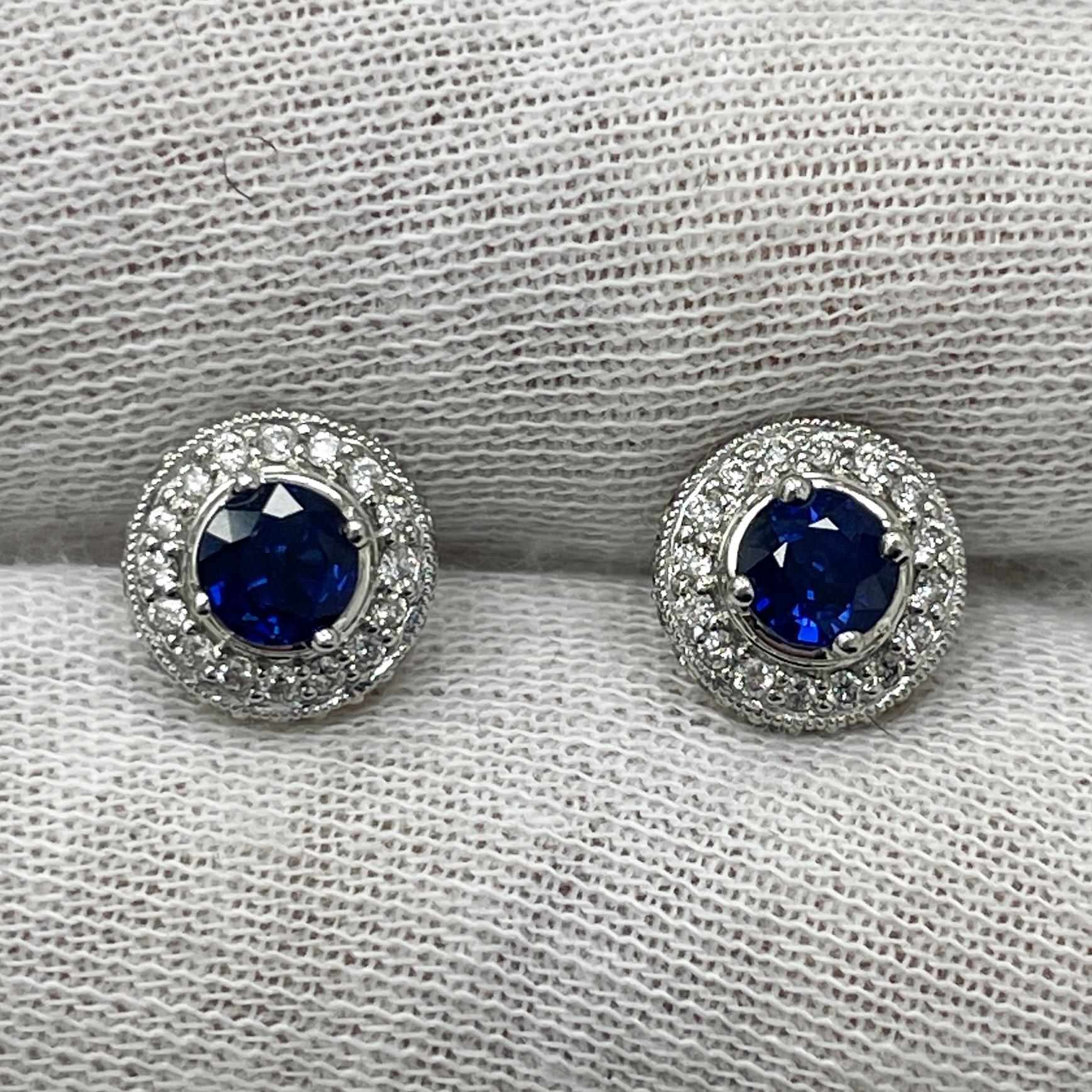 These studs are 18K white gold and carry .46Ct of brilliant white diamonds with 1.13Ct of 4.5MM royal blue sapphires