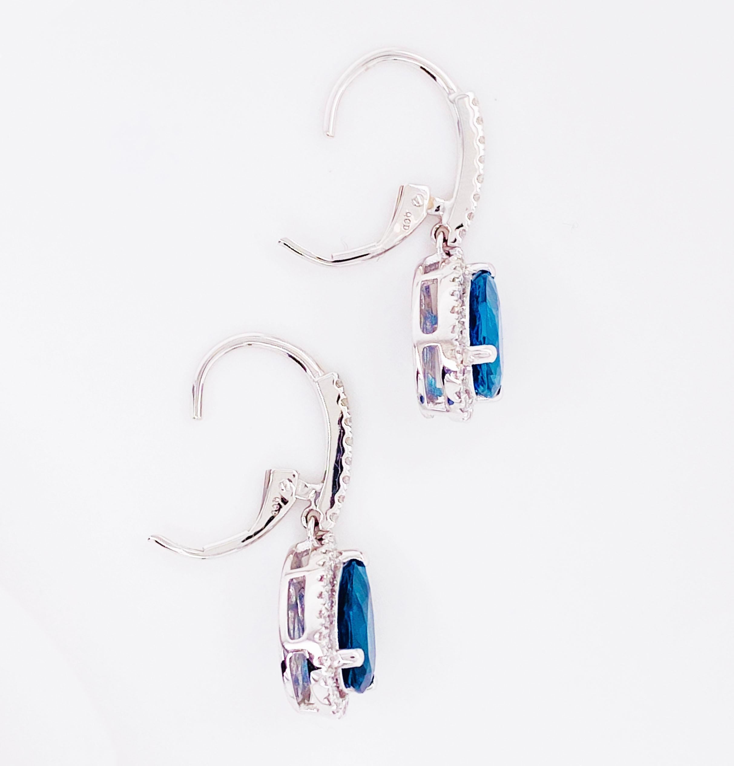 Pear Cut Royal Blue Topaz and Diamond Dangle Earrings in 14 Karat White Gold