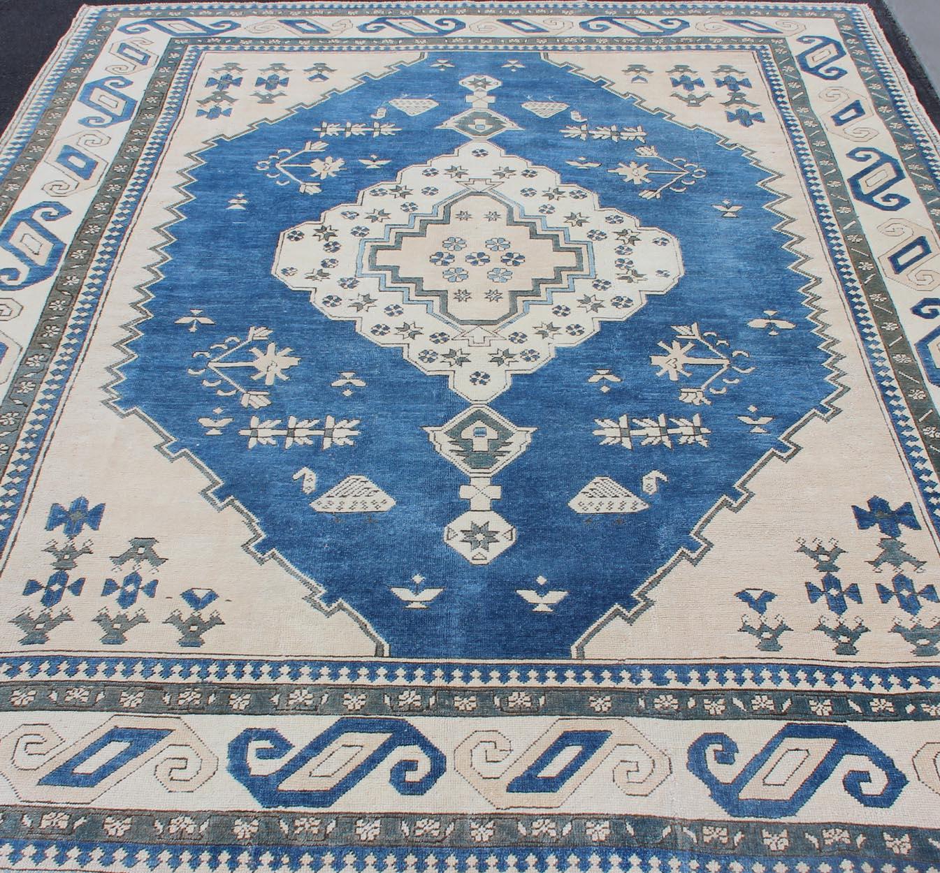 Wool Royal Blue, White and Taupe Vintage Turkish Rug with Geometric Medallion For Sale