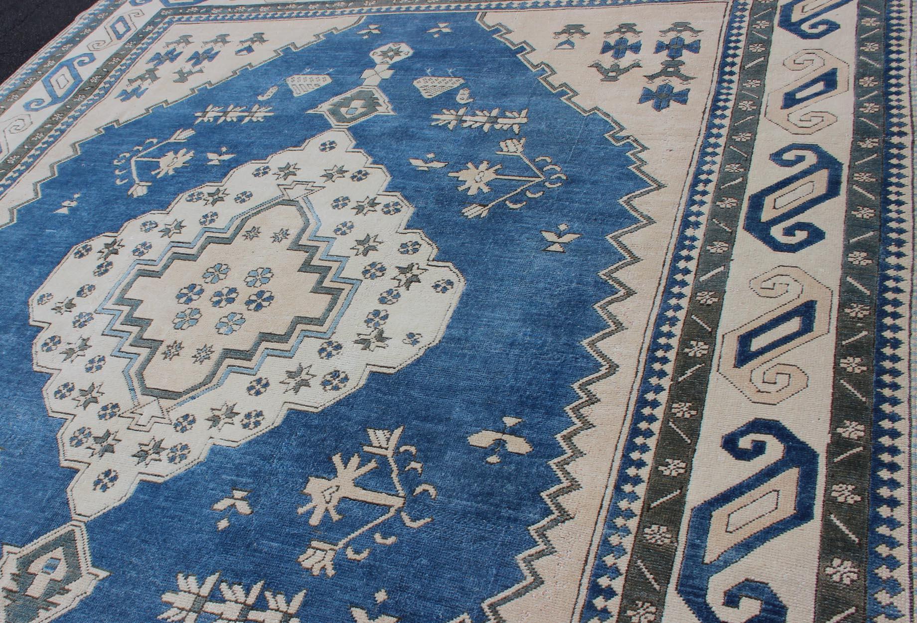Mid-20th Century Royal Blue, White and Taupe Vintage Turkish Rug with Geometric Medallion For Sale