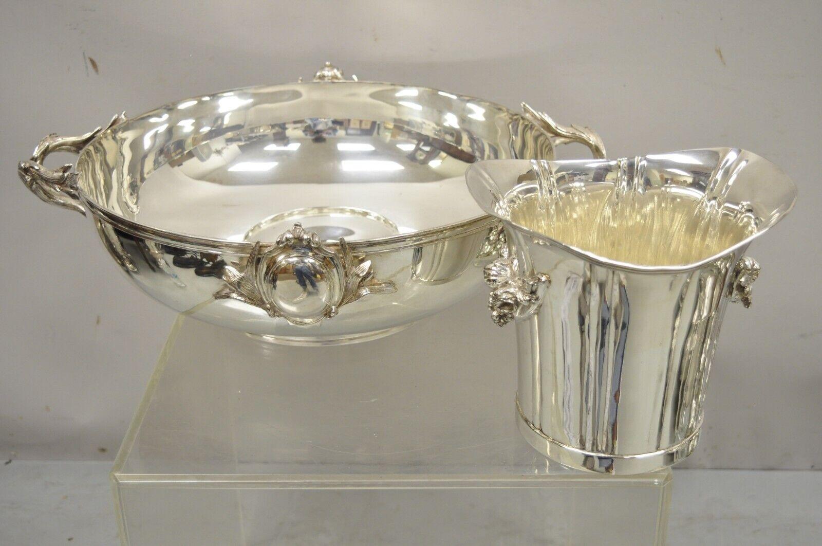 Vintage royal castle sheffield silver plated branch handle large punch bowl and ice bucket. Item features (1) large punch bowl with twin branch handles, (1) shapely champagne ice bucket which rests in center of bowl, very nice vintage item, quality
