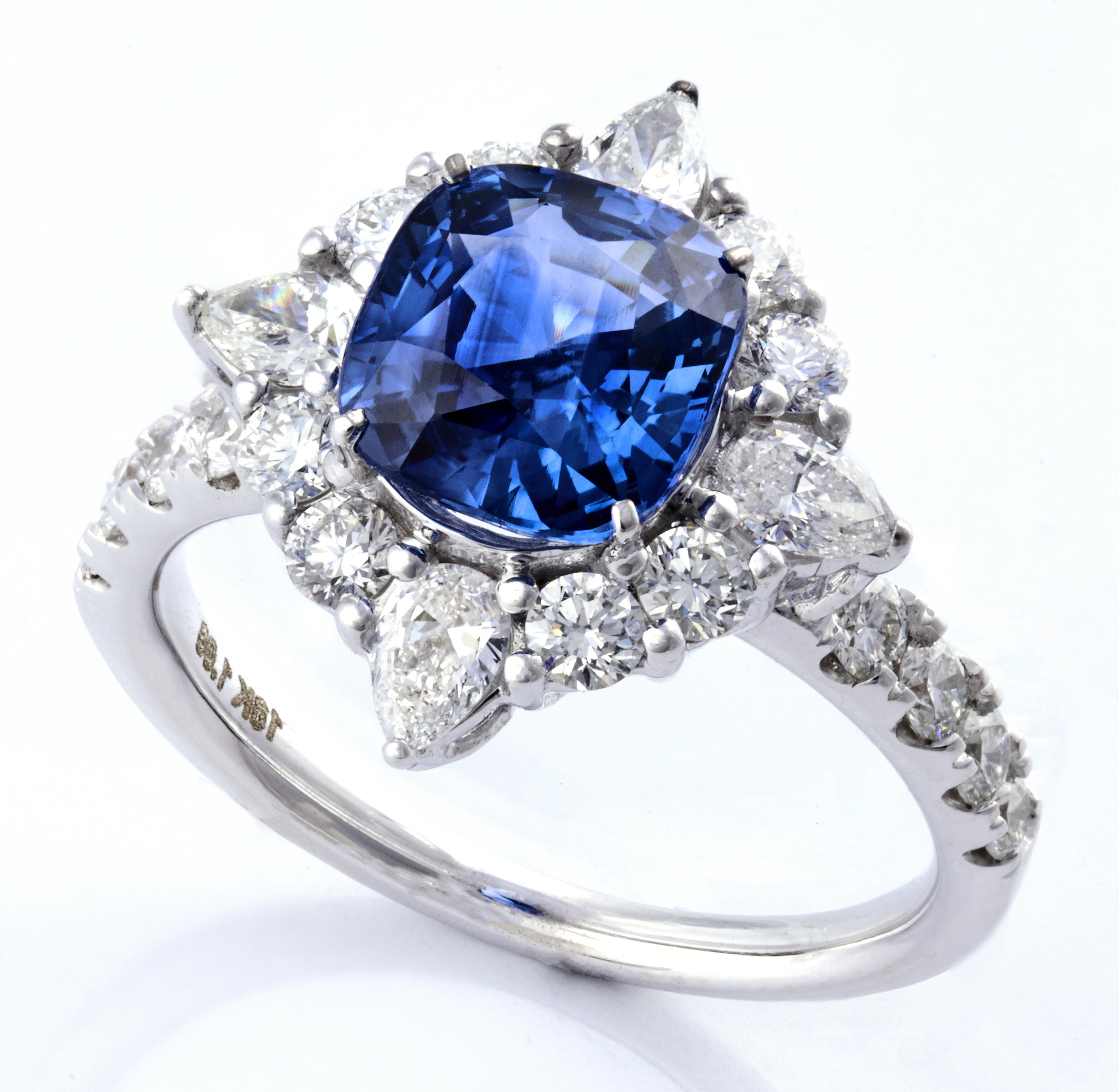 Oval Cut Royal Ceylon Blue Sapphire Ring Set in 18 Karat White Gold and VS/G Diamonds For Sale
