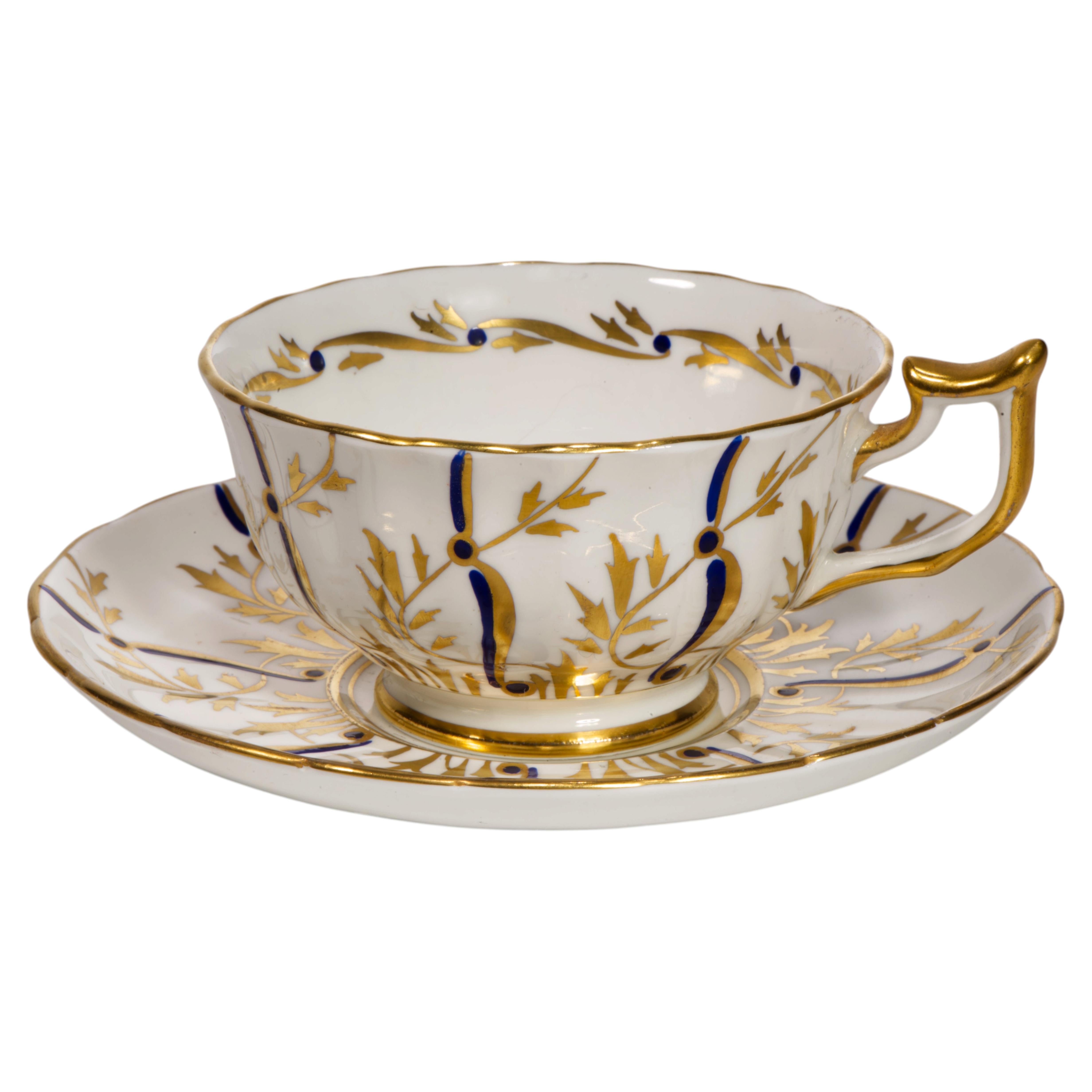 Tasse à thé et soucoupe en porcelaine Royal Chelsea Porcelain Art Deco bleu or et blanc, Angleterre 194