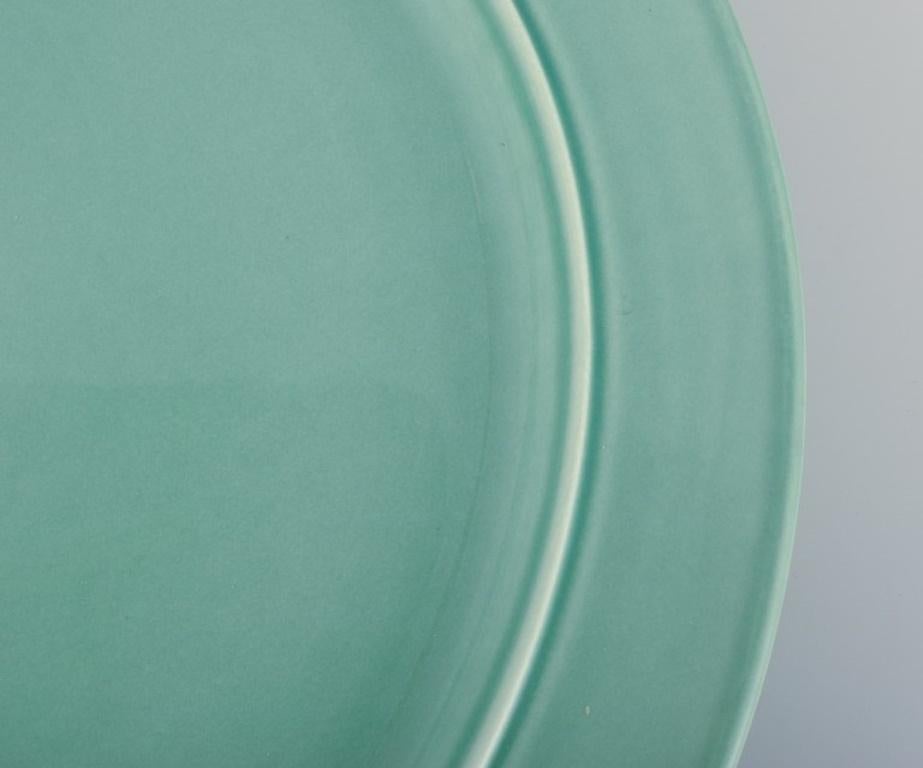 Vernissé Royal Copenhagen, « 4 All Seasons » Ensemble de quatre assiettes plates en faïence en vente