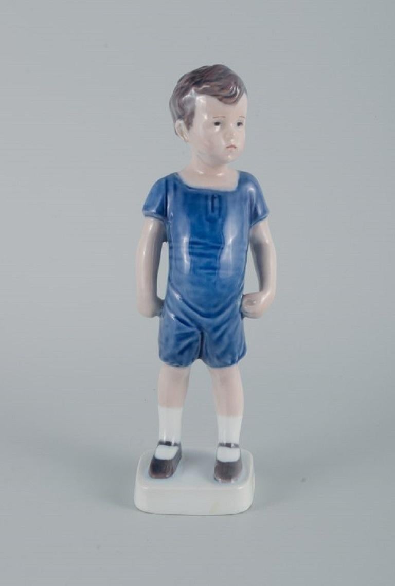 Royal Copenhagen, a rare figure of a boy.
Model number 519.
In great condition.
Second factory quality.
Dimensions: H 20.5 x W 5.5 cm.