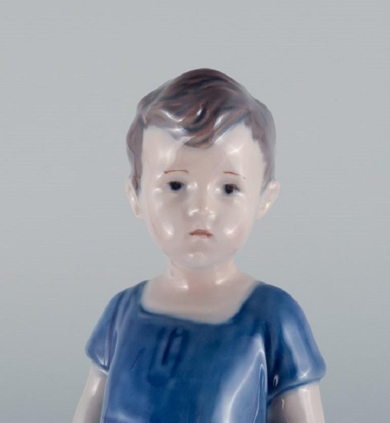 Royal Copenhagen, a Rare Figure of a Boy, Model Number 519 For Sale 1