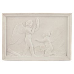 Royal Copenhagen. Amor and Hymen spins the thread of life.  Biscuit relief after