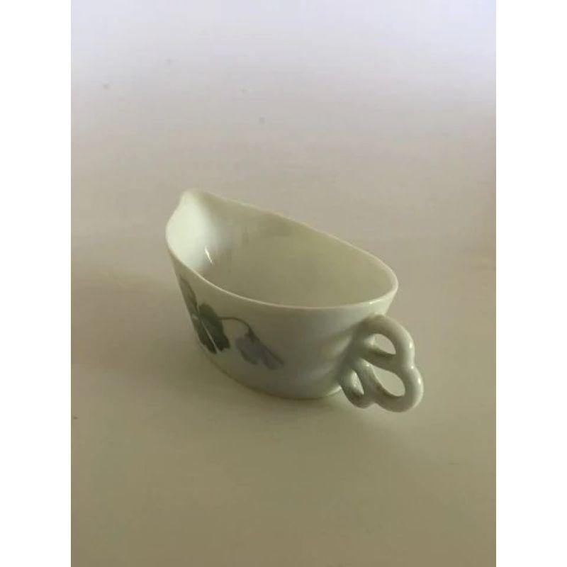 Royal Copenhagen Art Nouveau creamer with handle No. 198

Measures: 9 x 5 cm (3 35/64