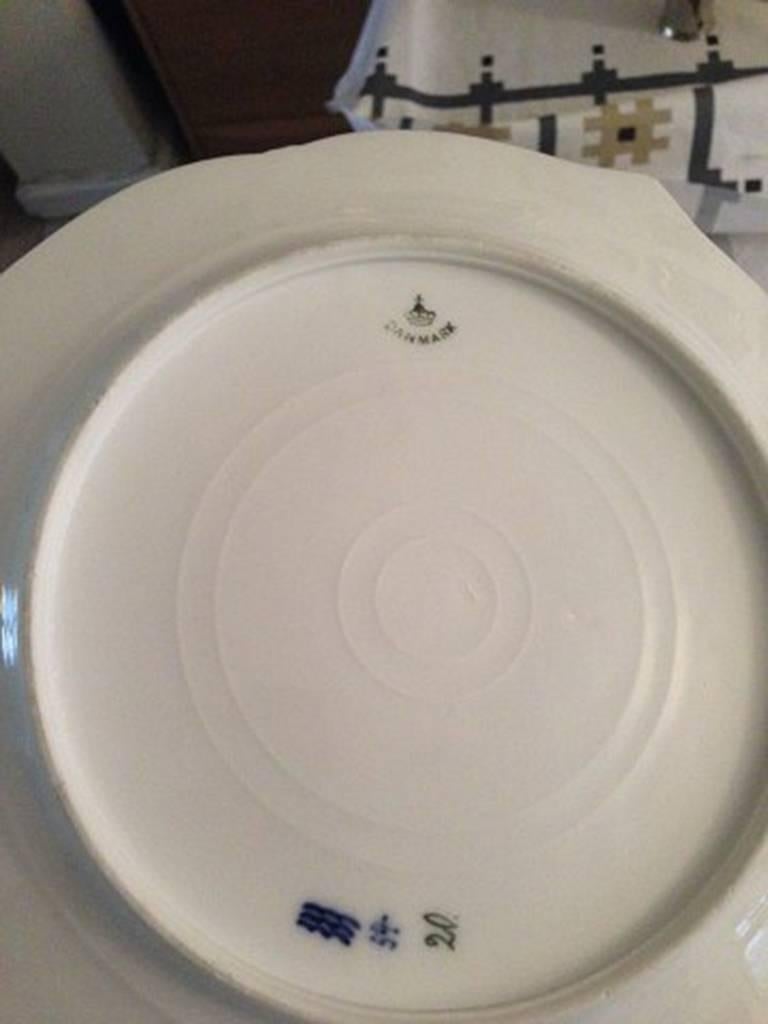 Royal Copenhagen Art Nouveau fish plate 2. Measures 24 cm and is in good condition. From 1894-1900.