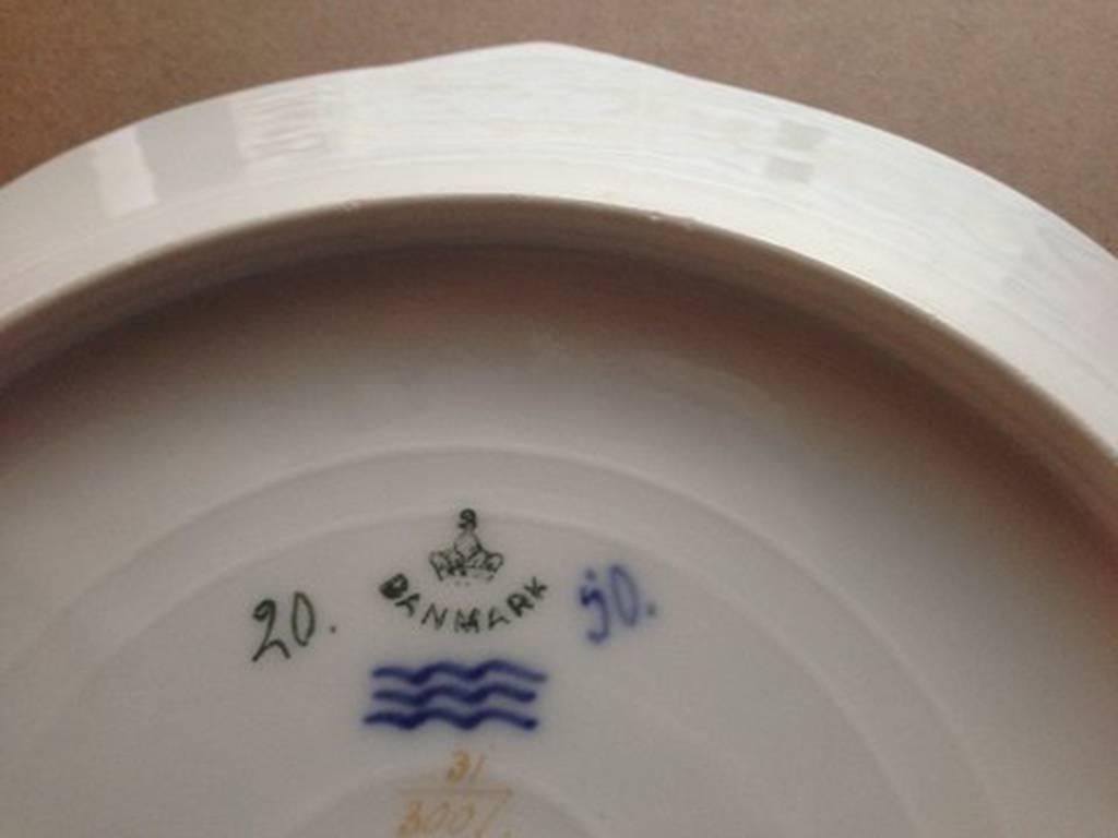 Royal Copenhagen Art Nouveau fish plate with Iris 1 of 3. Measures 24 cm and is in good condition.