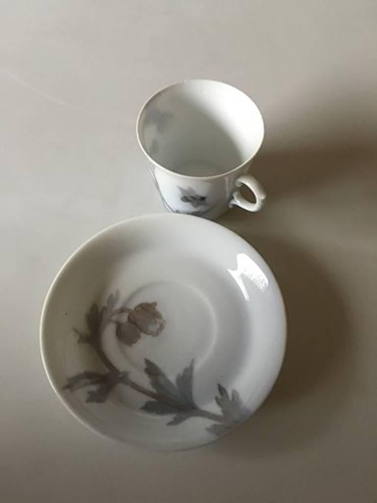 Royal Copenhagen Art Nouveau Mocha cup and saucer. The cup has to Hairlines and a chip. The saucer is in great condition. Cup measures 5.2 cm H. 5.8 cm dia.