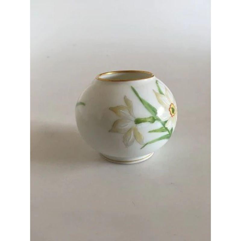 Royal Copenhagen Art Nouveau overglaze vase with spring flowers.

Measures 5.5cm and is in perfect condition.