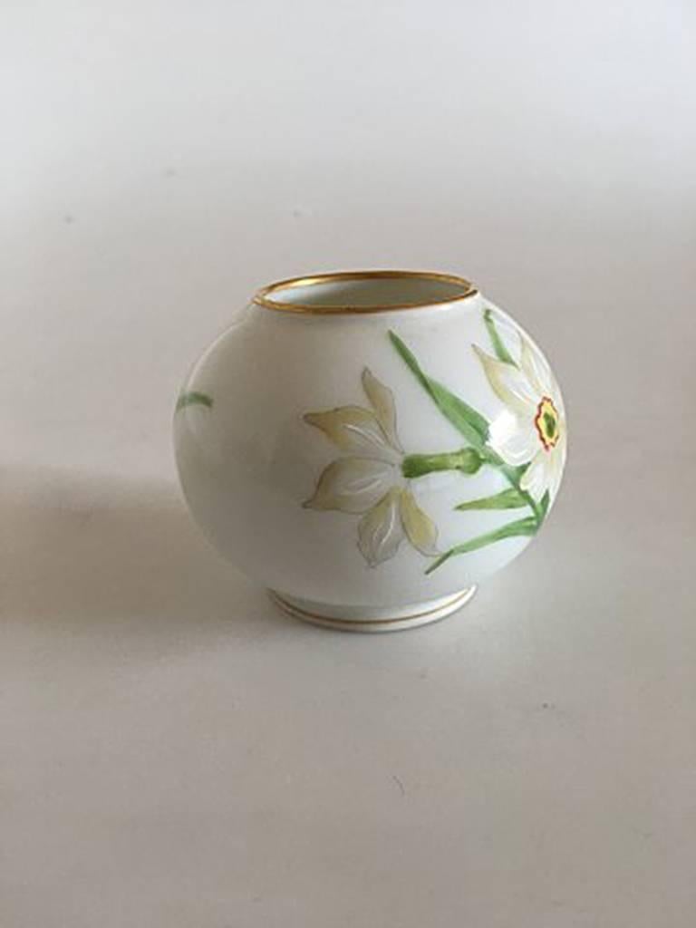 Royal Copenhagen Art Nouveau overglaze vase with spring flowers. Measures 5.5 cm and is in perfect condition.
