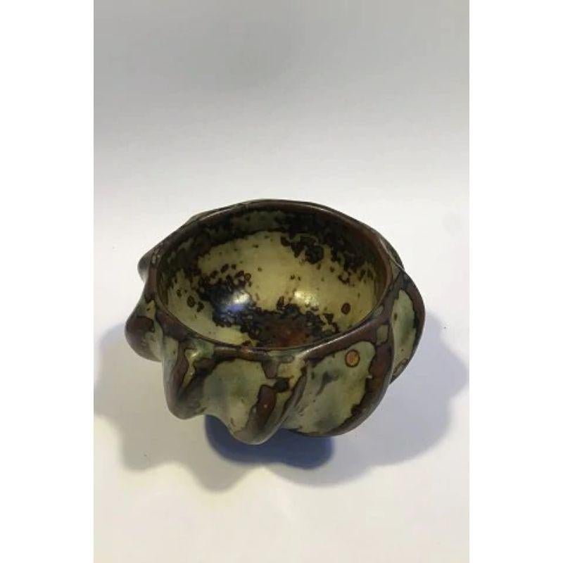 Royal Copenhagen Axel Salto Stoneware bowl No 20681

Sung glaze, budding style H. 5.5 cm2.16