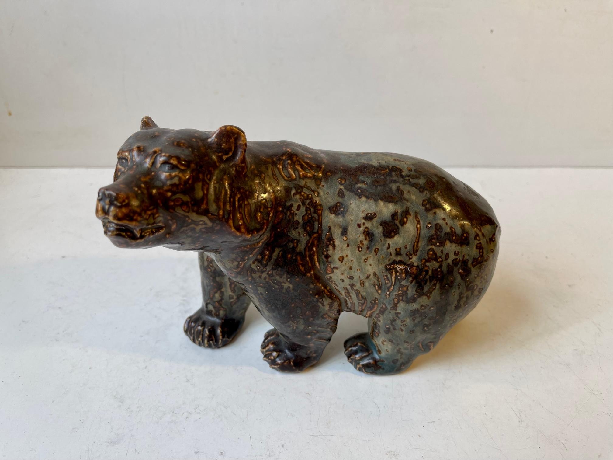 Rare hand-signed, numbered and marked bear sculpture. Designed by the Danish ceramist Knud Kyhn (KK) all the way back in 1929-36. Hugely inspired by the sung glazes applied in Axel Salto's and Bode Willumsen's this piece displays a great
