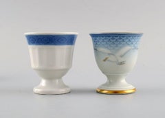 Royal Copenhagen, Bing & Grøndahl and Aluminia. Six egg cups in porcelain.