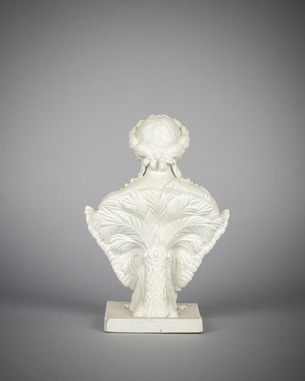 Il busto di Napoleone con un medaglione dettagliato con la testa di Medusa sopra la spalla dietro un'aquila e le sue ali spiegate e con una palma sul retro. Marcato Eneret sulla base.