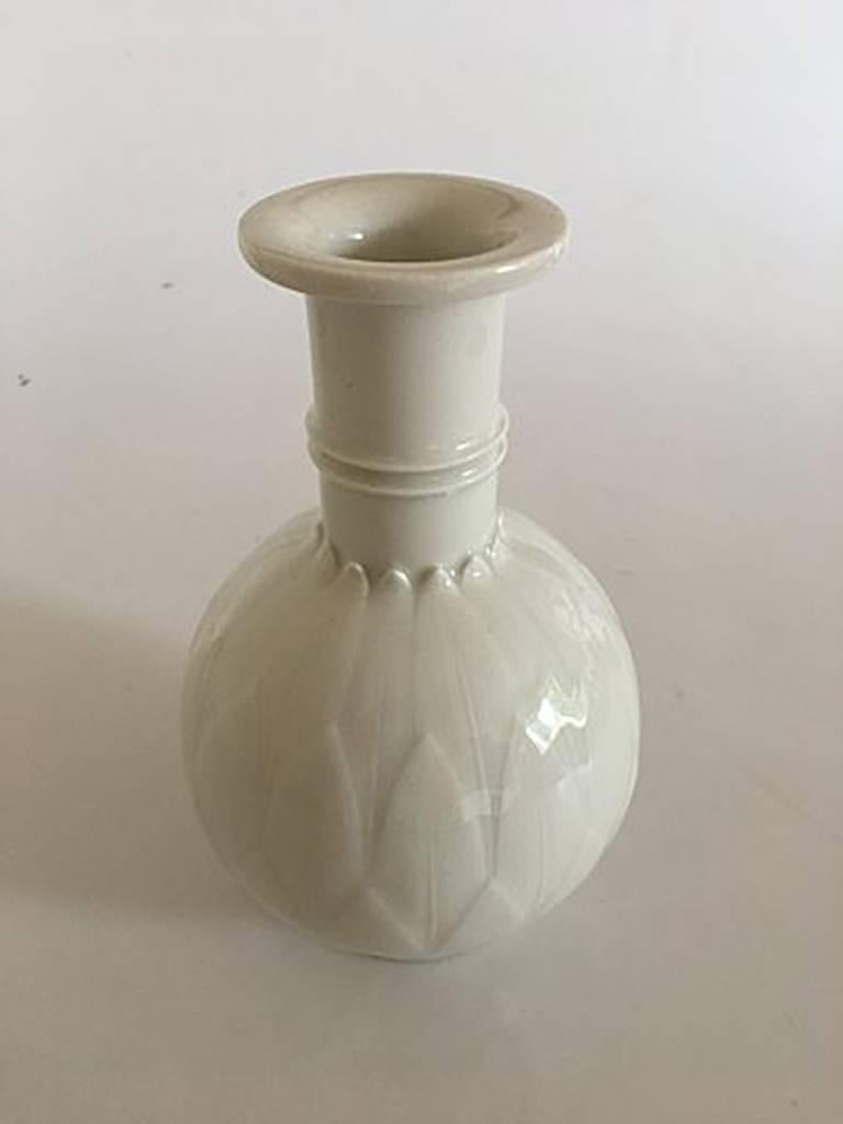 Royal Copenhagen blanc de chine vase by Arno Malinowski #3309.

Measures 20cm / 7 7/8