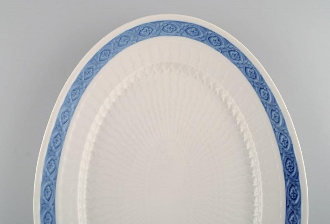 Royal Copenhagen Blue Fan serving dish. 1960s. 
Model number 1212/1508. Designed by Arnold Krog in 1909.
Measures: 38 x 27 cm.
In excellent condition.
Stamped.
1st factory quality.