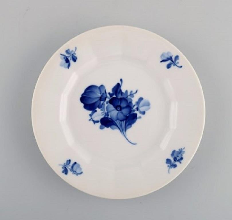 Royal Copenhagen blue flower angular. Twelve coffee cups with saucers and twelve plates. 
Model number 8608.
The cup measures: 9 x 5.8 cm.
Saucer diameter 14 cm.
Plate diameter 16 cm.
1st factory quality.
In excellent condition.