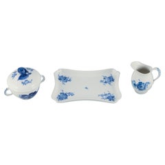 Royal Copenhagen Blue Flower Braided, creamer and sugar bowl on tray.